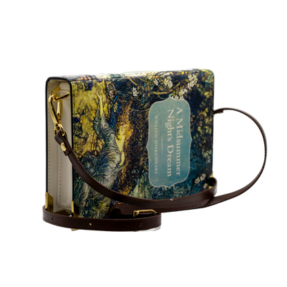 Handbag with floral pattern and visible brand name on a white background