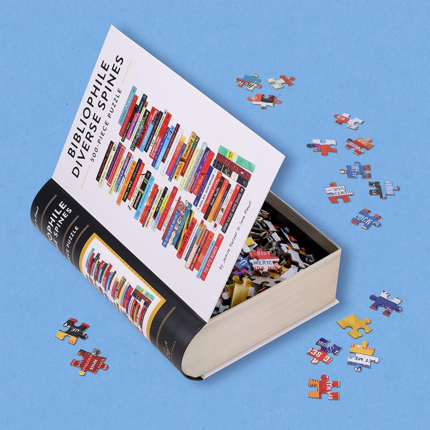 Book-shaped puzzle with colorful pieces on a blue background