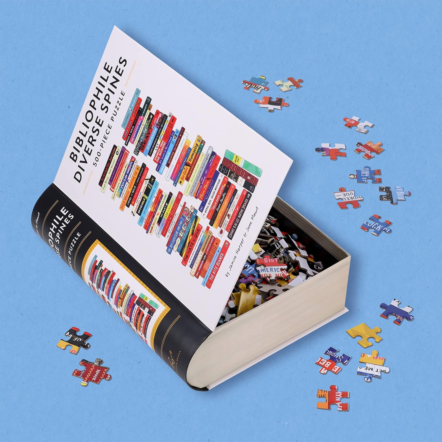 Book-shaped puzzle with colorful pieces on a blue background