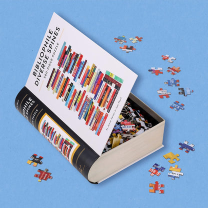 Book-shaped puzzle with colorful pieces on a blue background