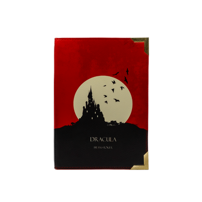 Book cover of 'Dracula' with a red background, moon, and castle silhouette.