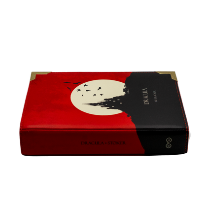 Red and black box with a moon and tree design on a white background
