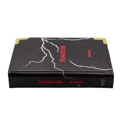 Black electronic device with red text and lightning design on a white background