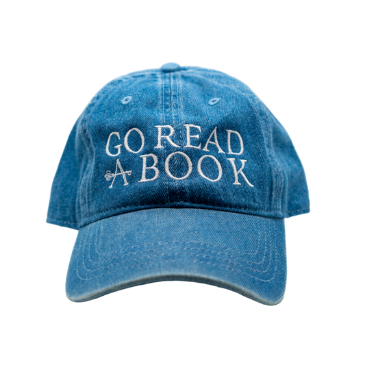 Blue denim cap with 'GO READ A BOOK' text on a white background