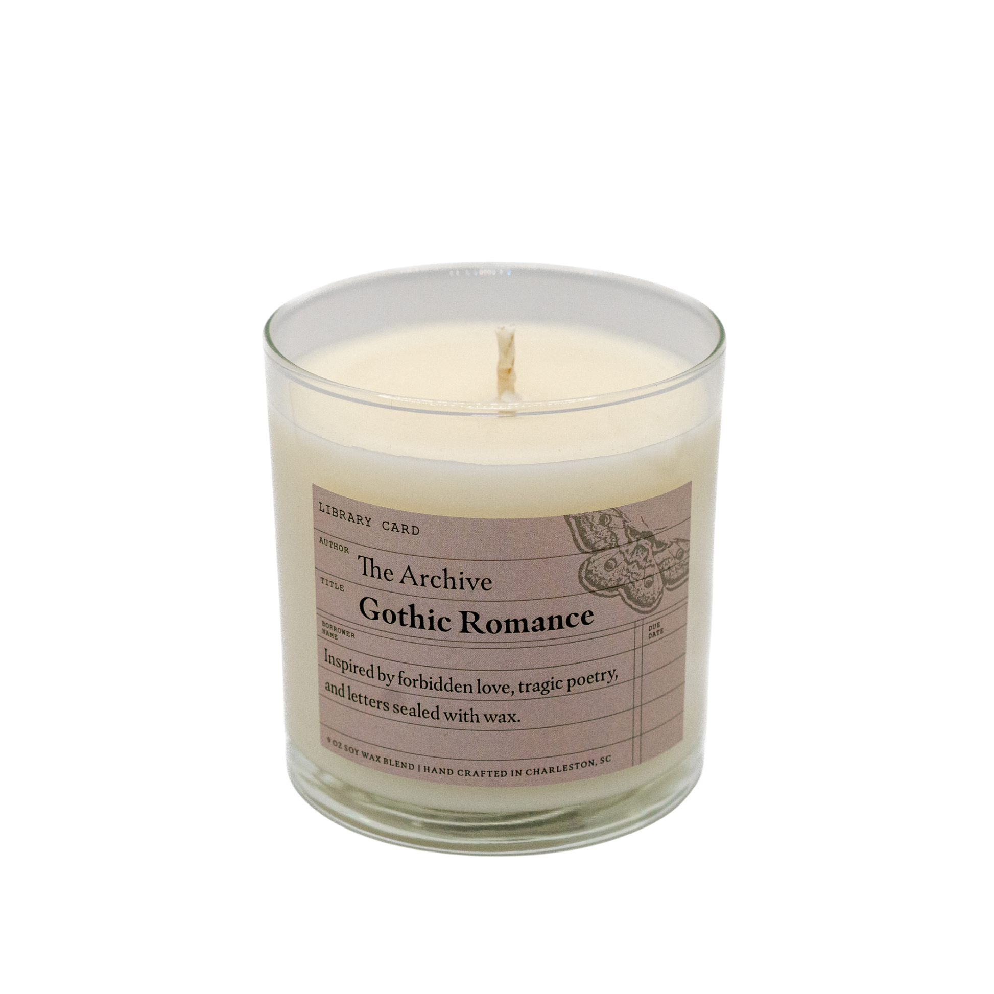 Candle in a glass jar with a label on a white background