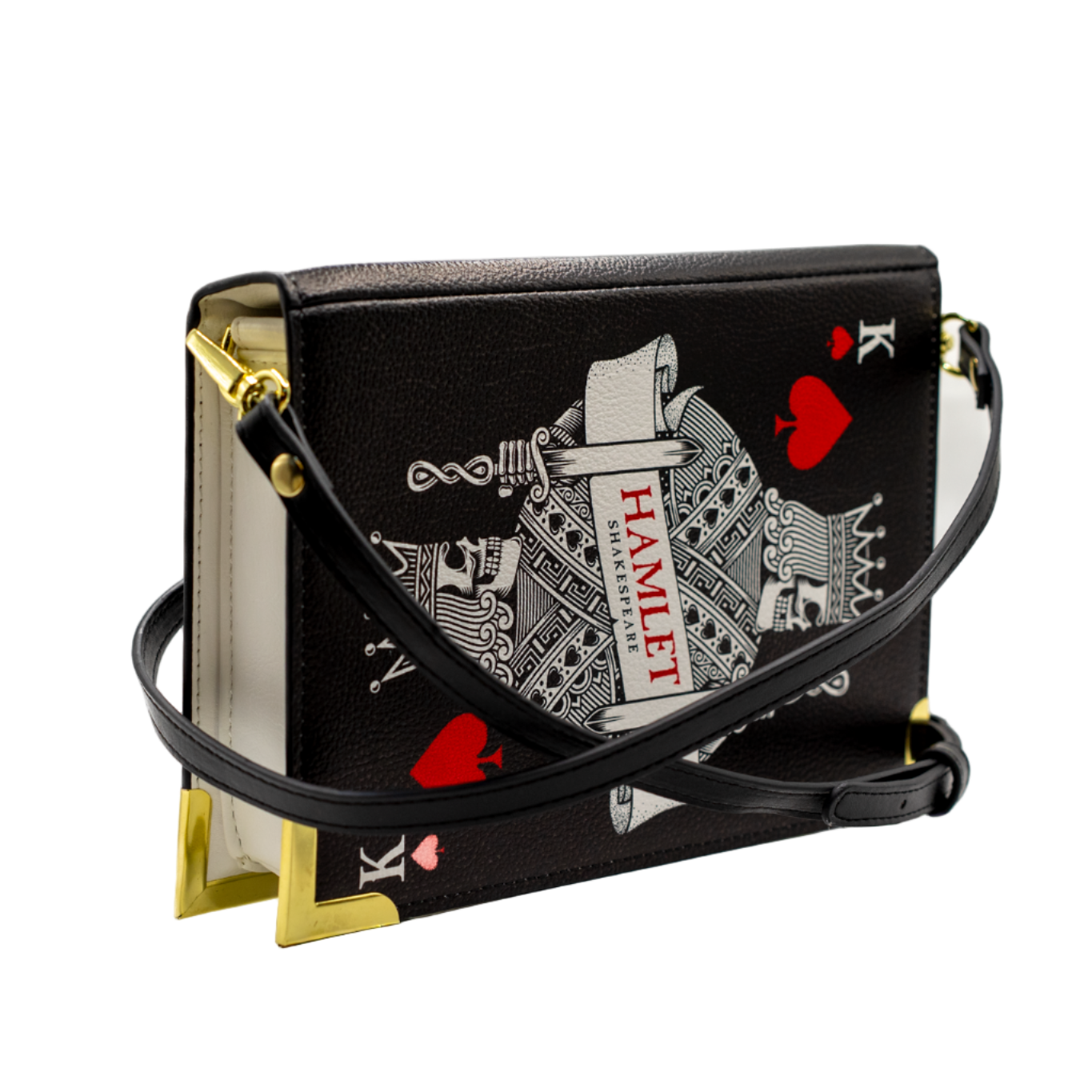 Black handbag with playing card design on a white background