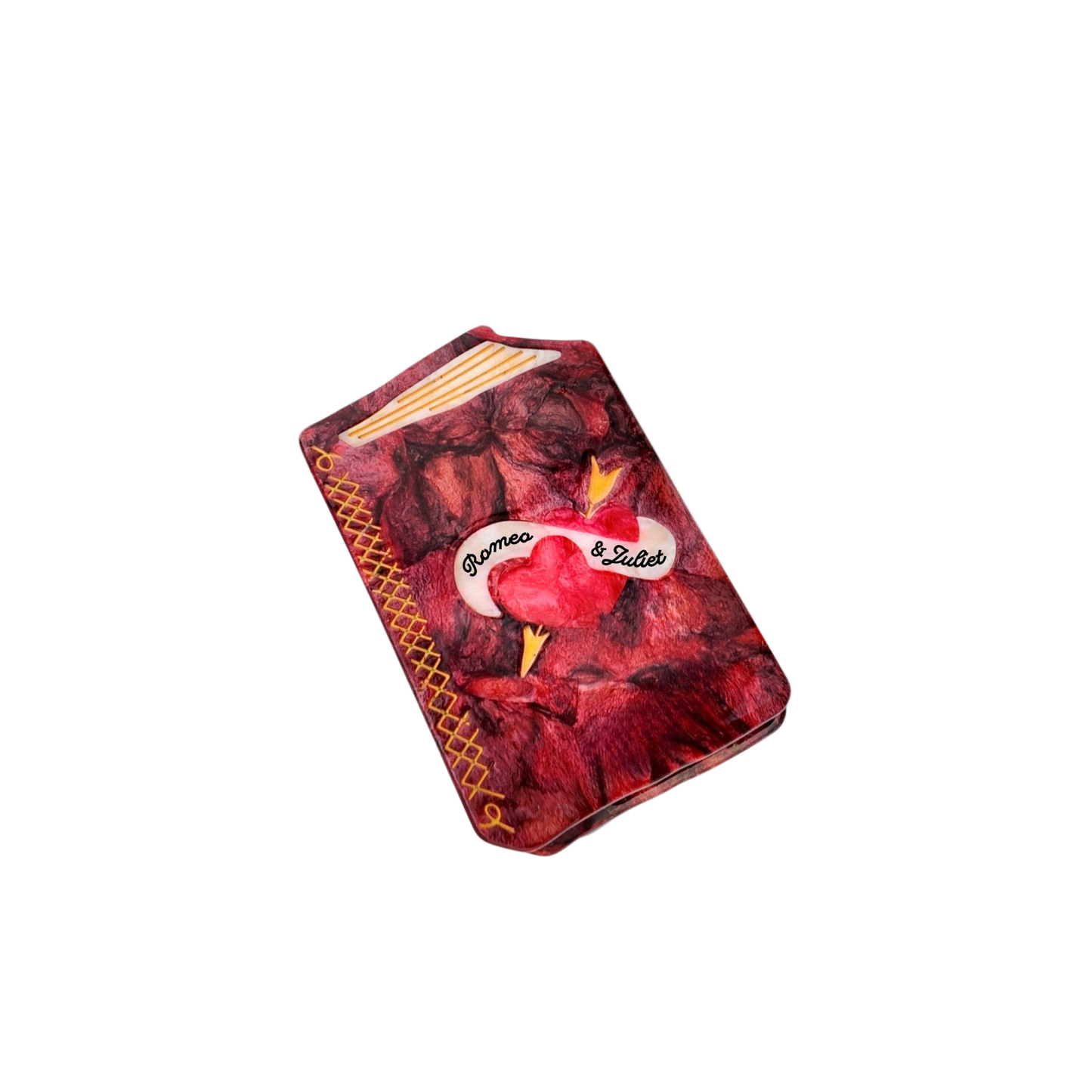 Book pin with a red heart design and text on a white background