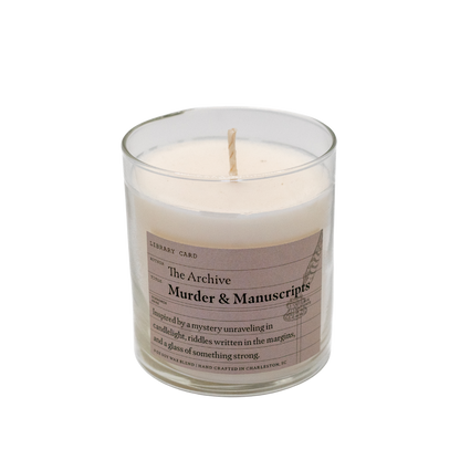 Murder & Manuscripts Candle - 9 oz in a glass jar with a label on a white background