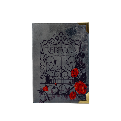 Book with decorative cover featuring the name 'Rebecca' and red roses on a white background