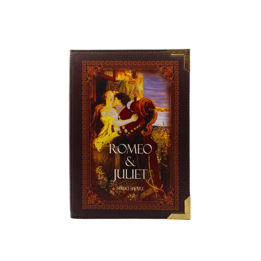 Book cover of 'Romeo & Juliet' with a romantic illustration on a white background