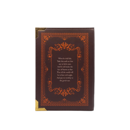 Decorative book with ornate design and text on a white background