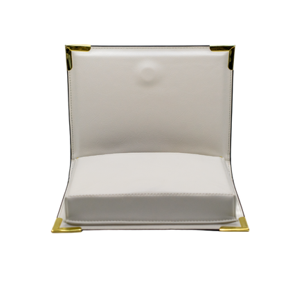 book handbag with gold accents on a white background