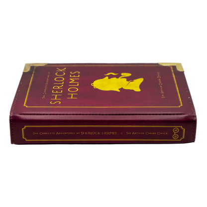 Maroon book-shaped box with 'Sherlock Holmes' text and yellow silhouette on a white background