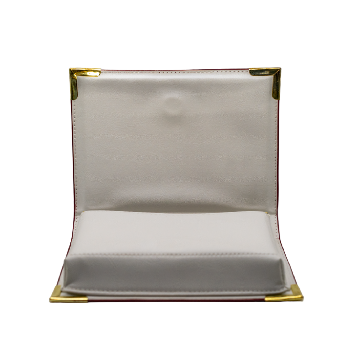 White rectangular object with gold border on a white background