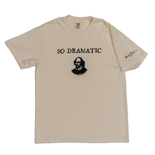 Beige t-shirt with a graphic and text 'SO DRAMATIC' on a white background