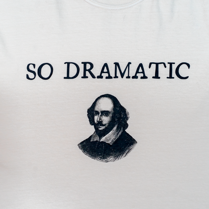 White shirt with Shakespeare illustration and 'SO DRAMATIC' text on a white background