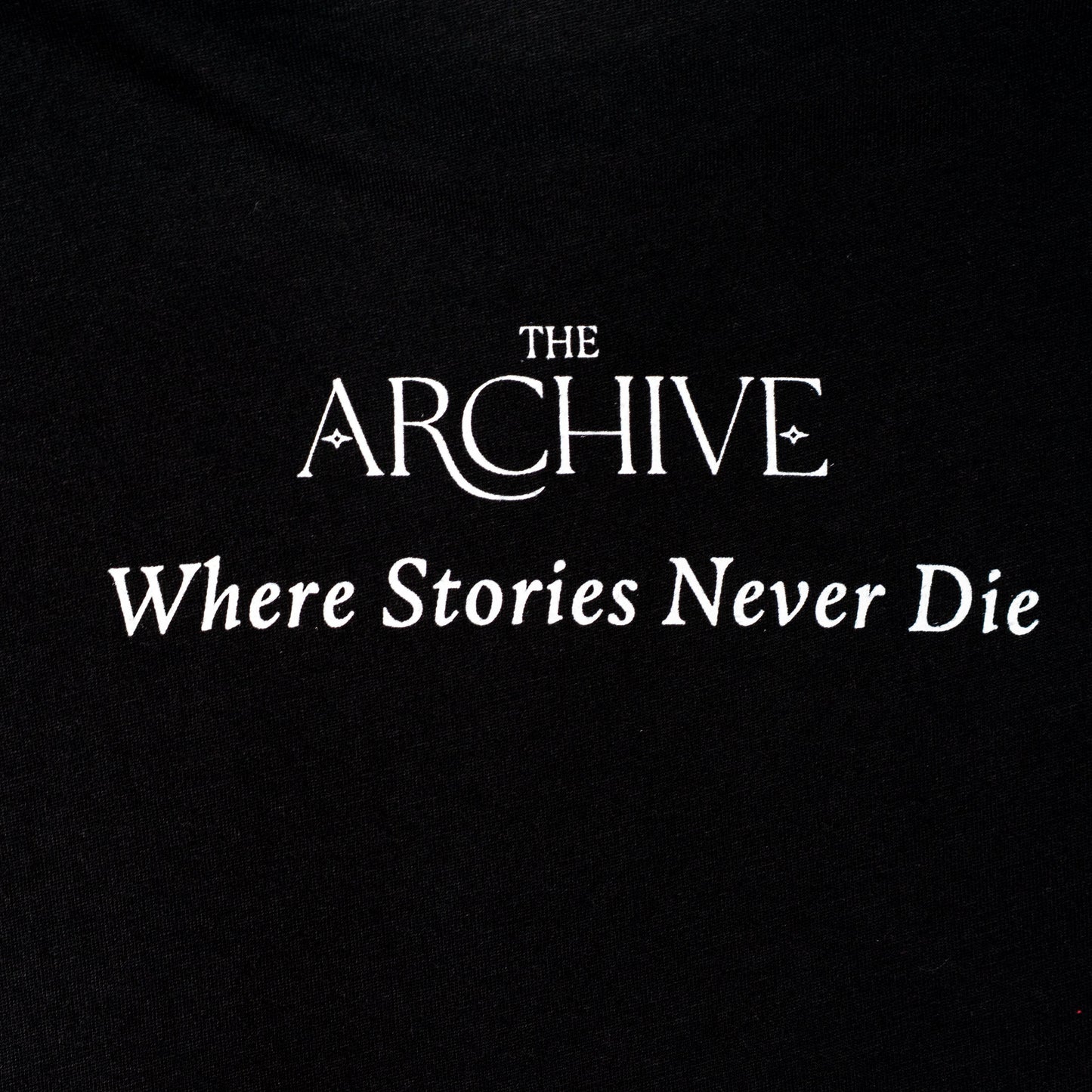 Black t-shirt with 'The Archive Where Stories Never Die' text in white.