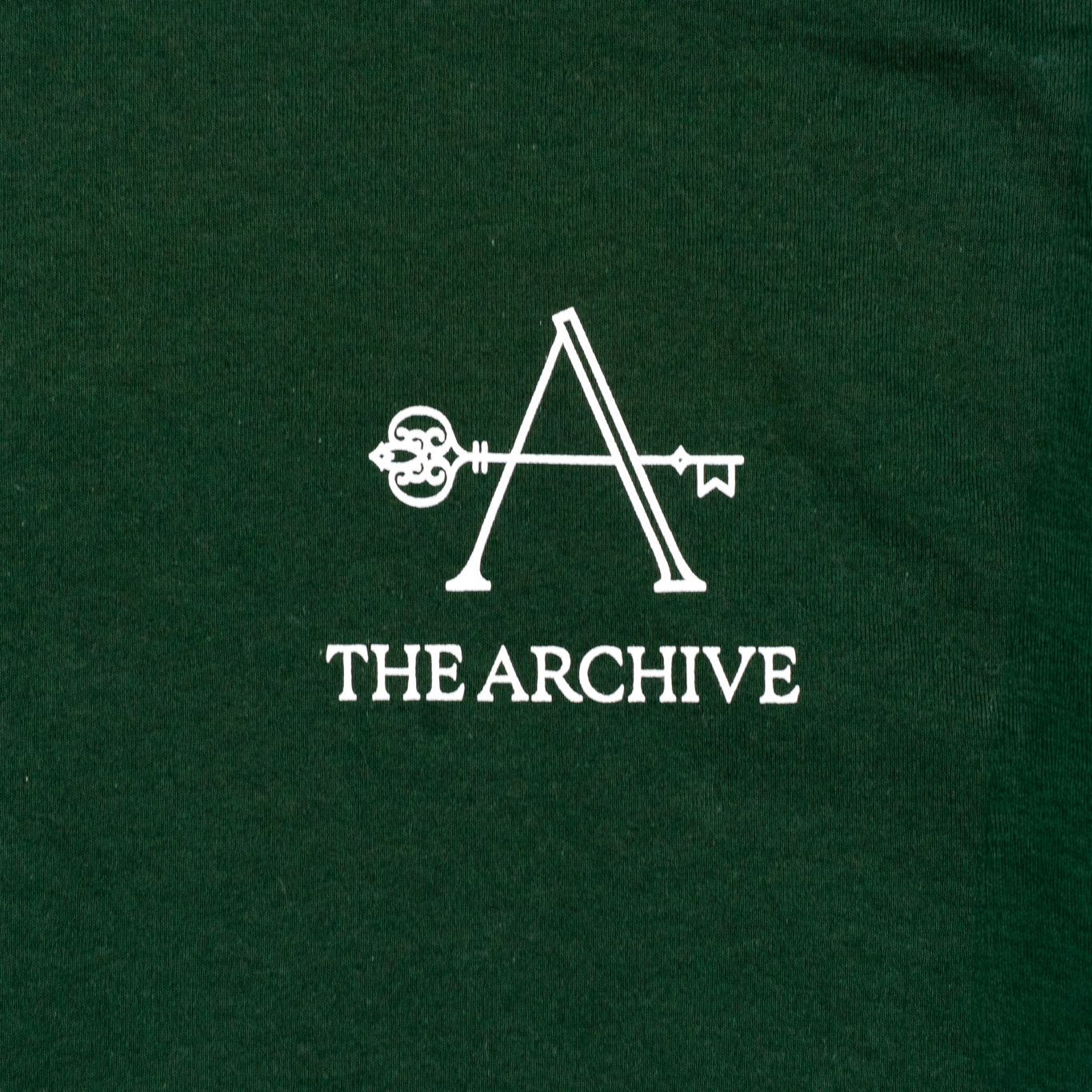White logo and text 'The Archive' on a dark green background