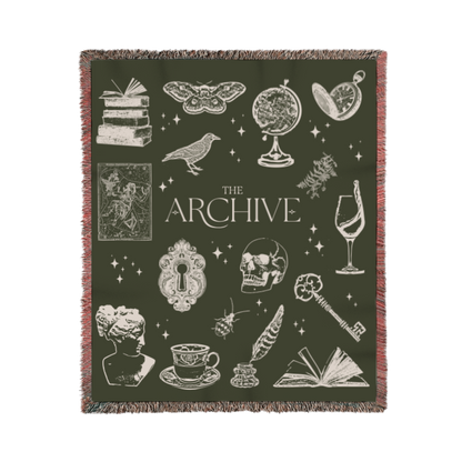 Blanket with vintage-style illustrations and 'The Archive' branding on a dark green background