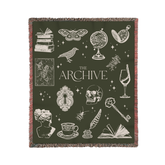 Blanket with vintage-style illustrations and 'The Archive' branding on a dark green background