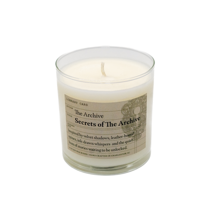 The Secret Society 9oz Candle with a label on a white background